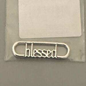 NWT Pandora silver Blessed script charm.